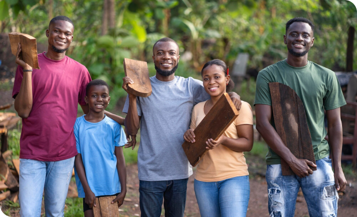 People holding wooden logs